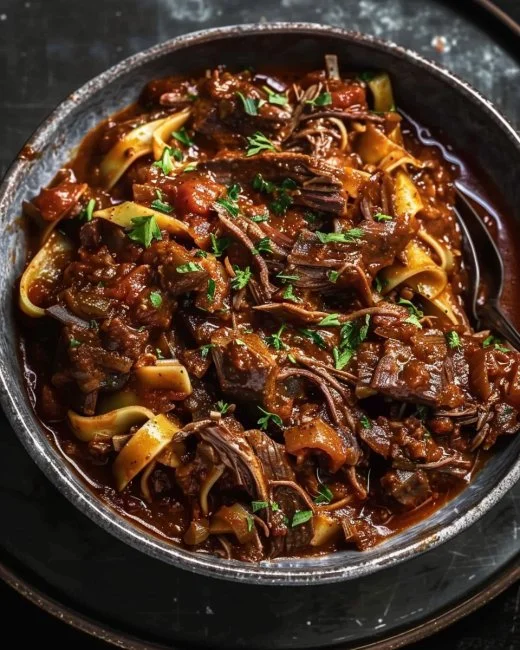 Slow-Cooked Short Rib Ragù 2 Delicious slow-cooked short rib ragù served with pasta