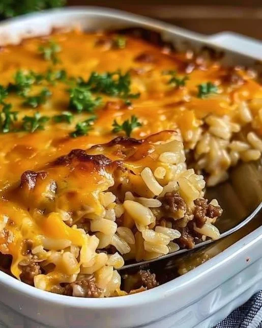 Cheesy Ground Beef Rice Casserole 2 Cheesy Ground Beef Rice Casserole served in a baking dish