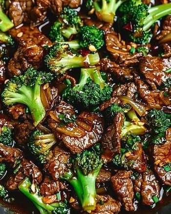 Chinese Beef and Broccoli 2 Delicious plate of Chinese Beef and Broccoli with rich sauce and steamed rice