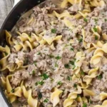 Delicious plate of homemade ground beef stroganoff served with noodles.