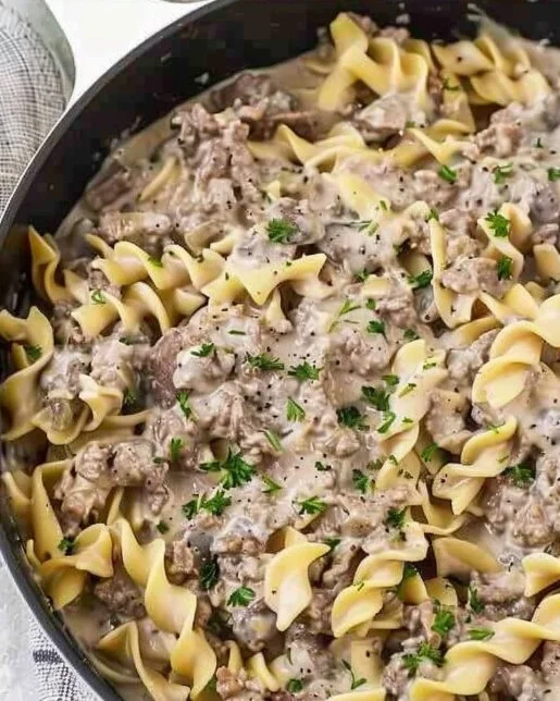 Delicious plate of homemade ground beef stroganoff served with noodles.