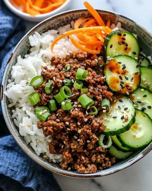 Korean Ground Beef Bowl 2 Korean Ground Beef Bowl garnished with vegetables and sesame seeds