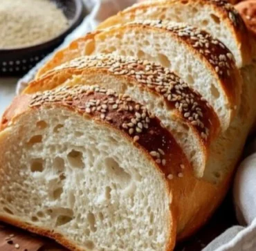 Freshly baked air fryer bread with crispy crust and fluffy interior