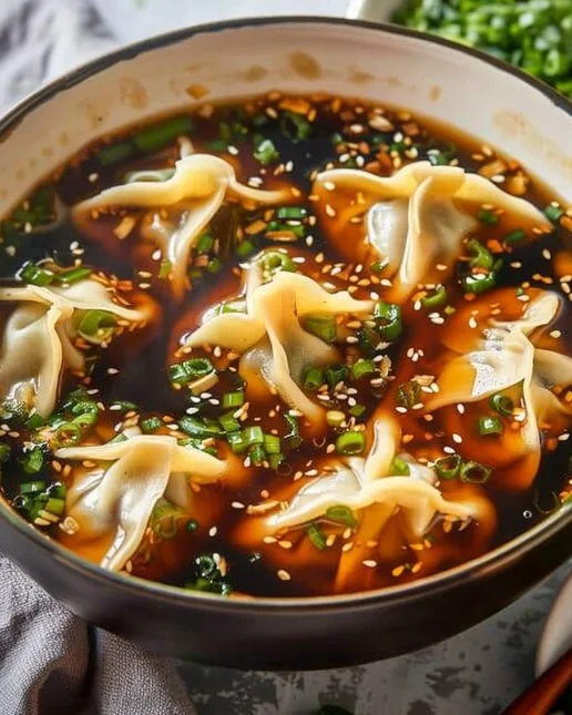 Potsticker Soup 2 Delicious bowl of homemade potsticker soup with dumplings and vegetables